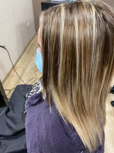 Blond met warme highlights